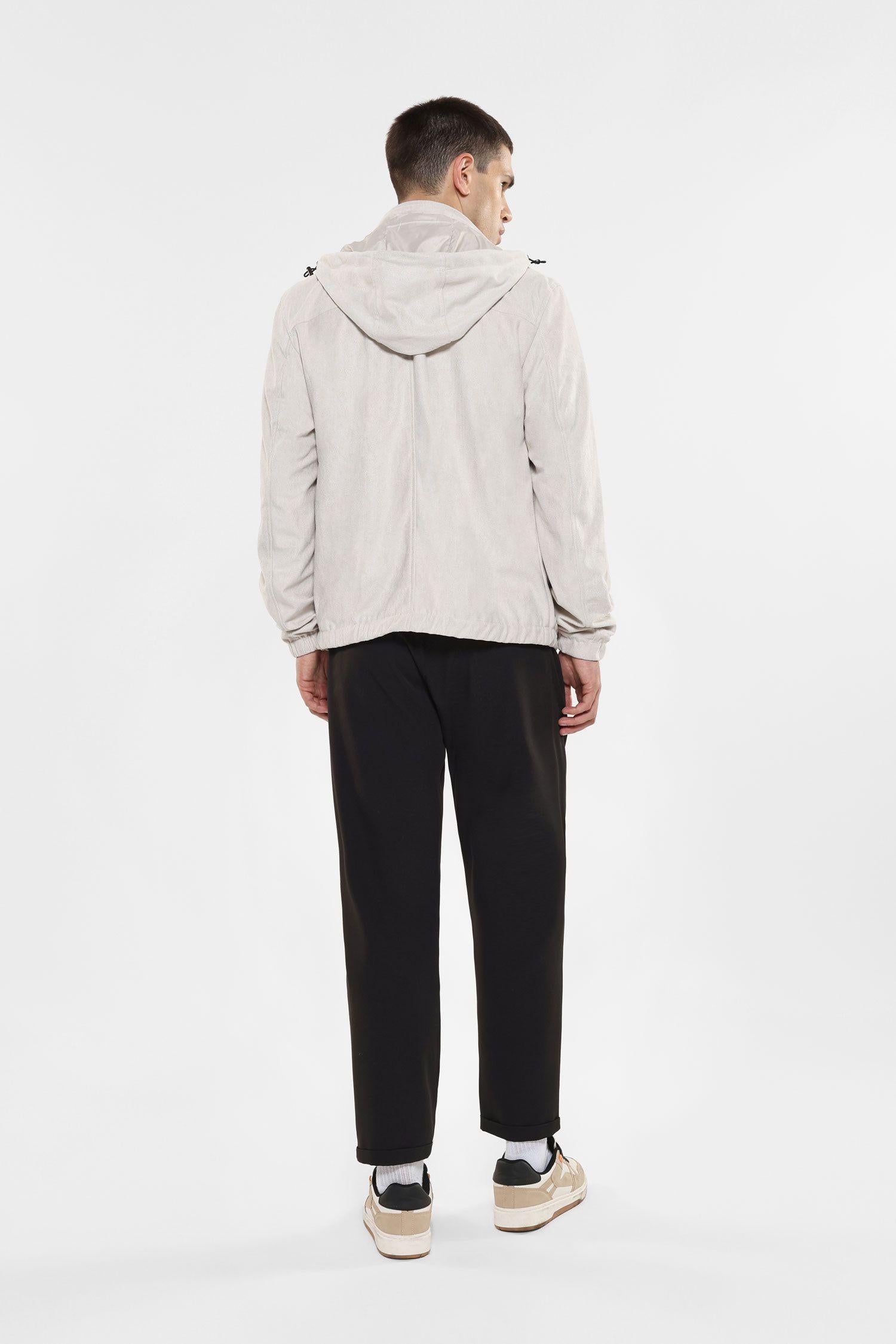 Pantaloni slim-fit con tasche verticali e orlo inferiore risvoltato