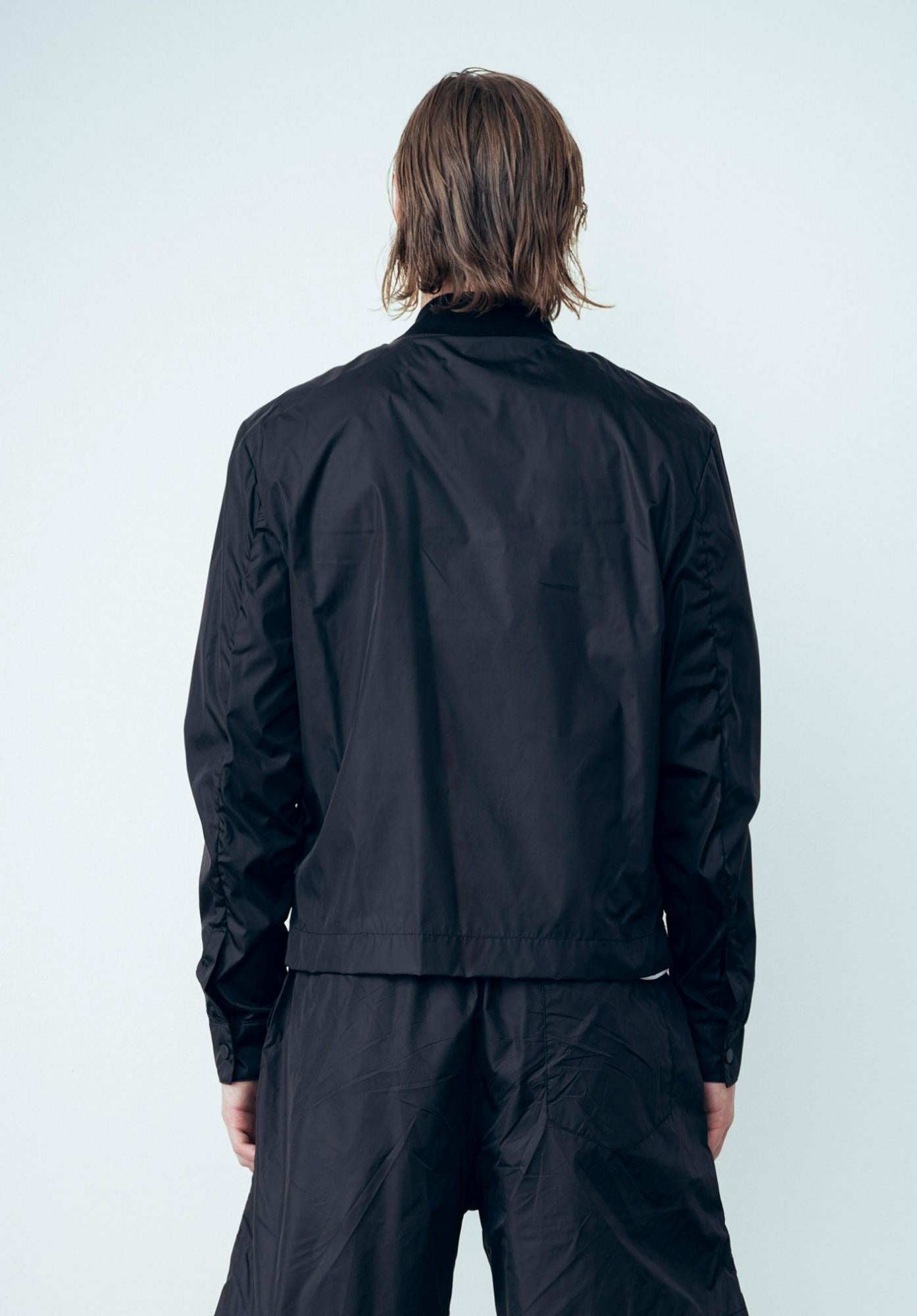 OVER-SLEEVE NYLON JACKET